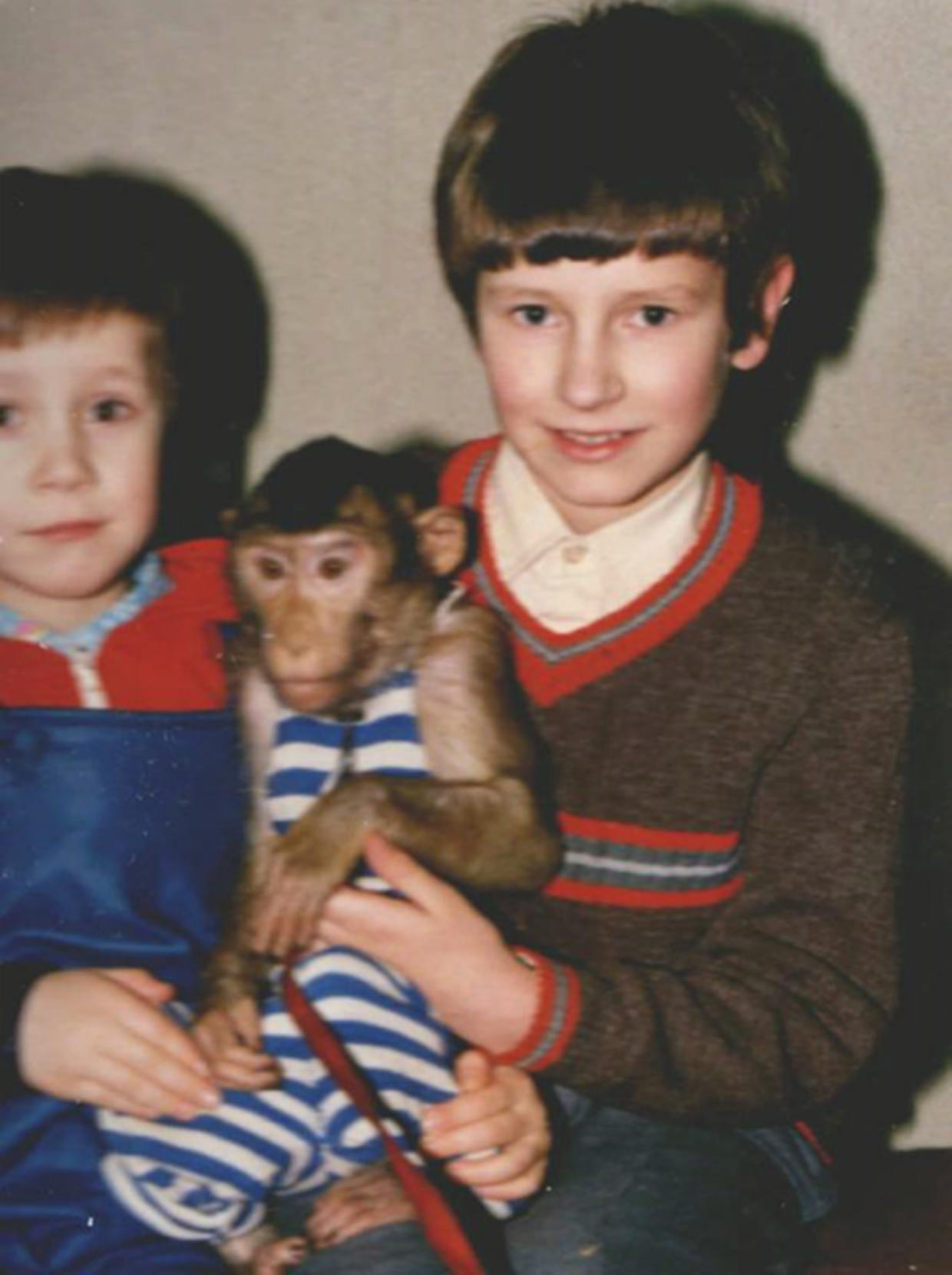 1990, with brother and monkey